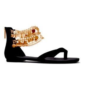 Black and gold sandals